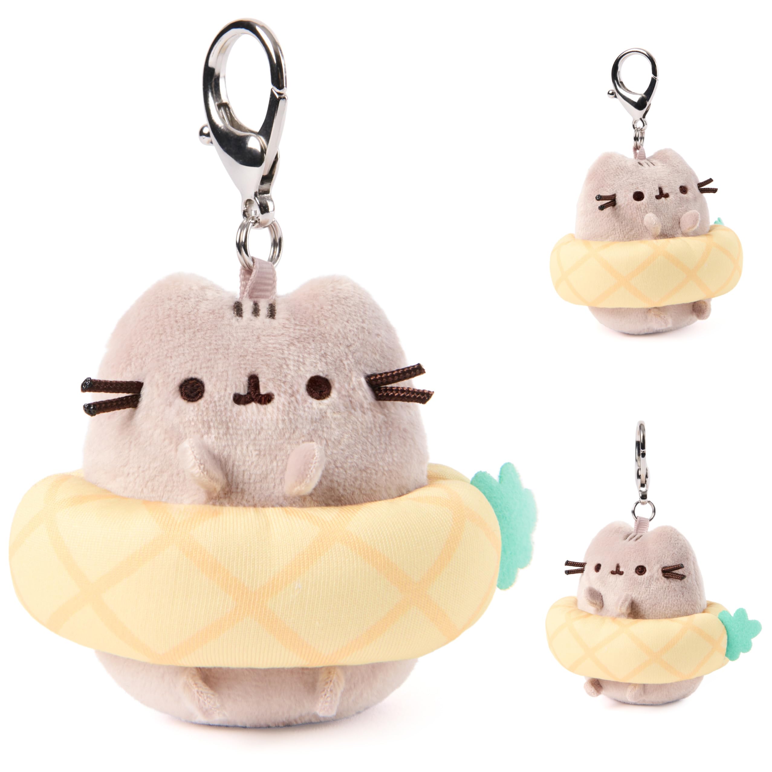 GUND Pusheen posed with beach props creating a playful tropical vibe