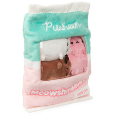 Pastel pink and green bag enhances desk or shelf decor.