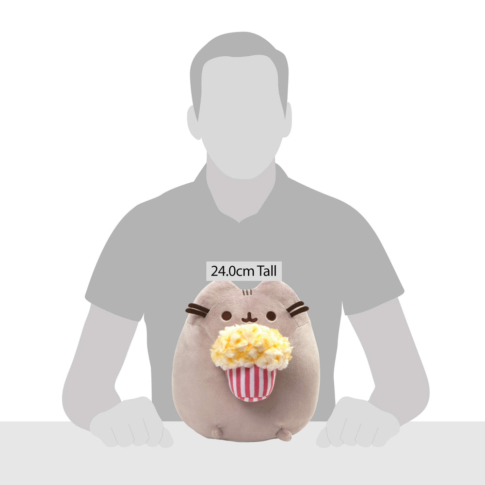 Pusheen plush with popcorn bucket detail, perfect for cuddling and gifting.