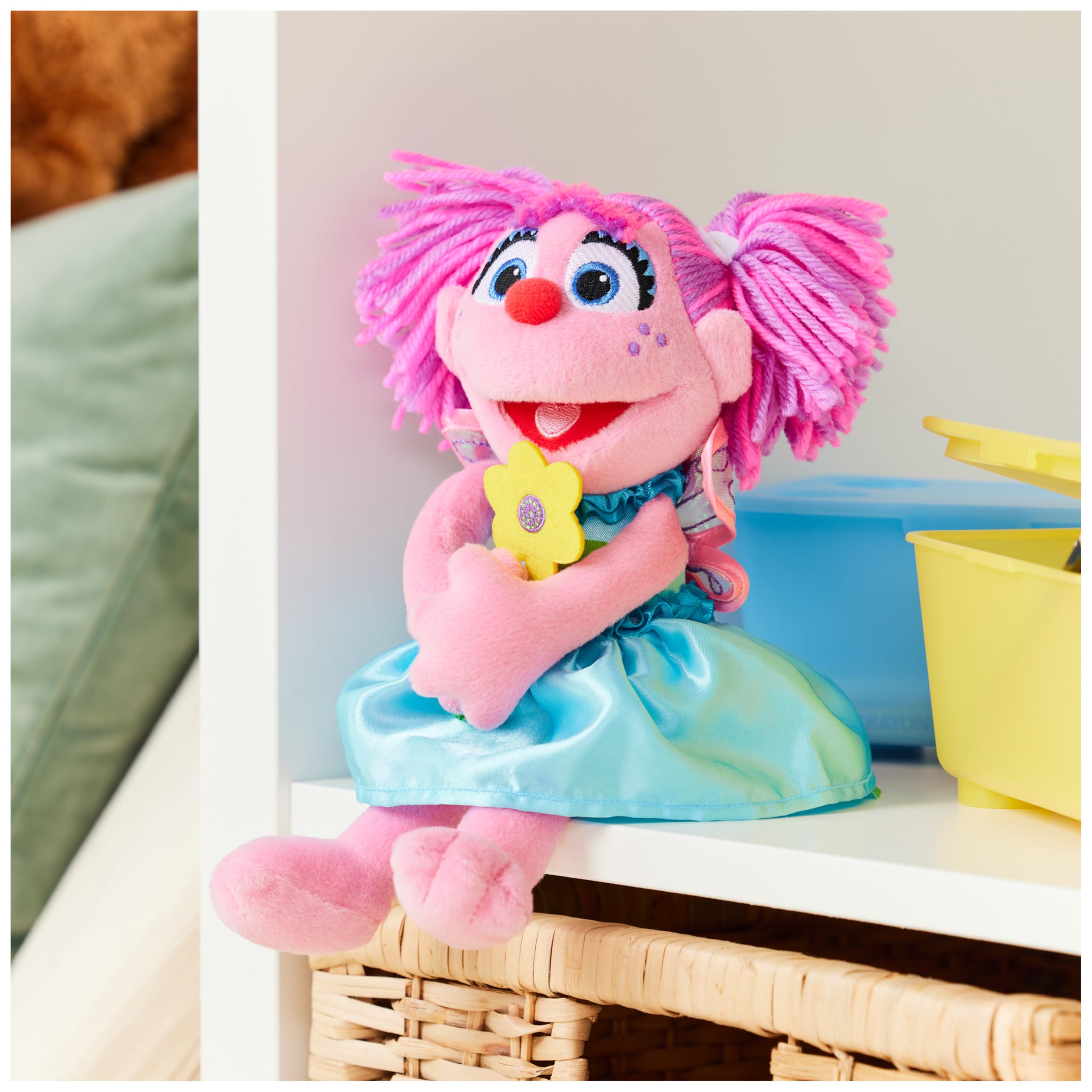 GUND Abby Cadabby plush holding a yellow flower for cheerful moments