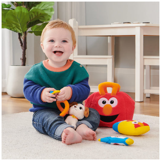 GUND Sesame Street Tango squeaker for tactile exploration.