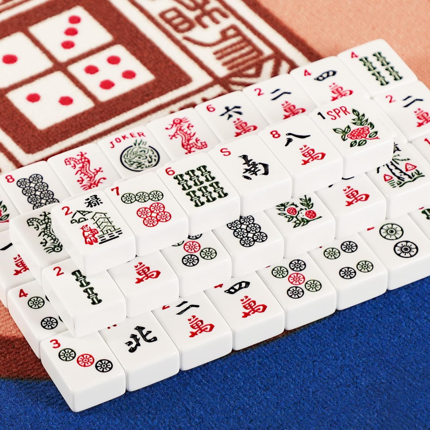 GUSTARIA tiles engraved with English letters and numerals for easy reading.