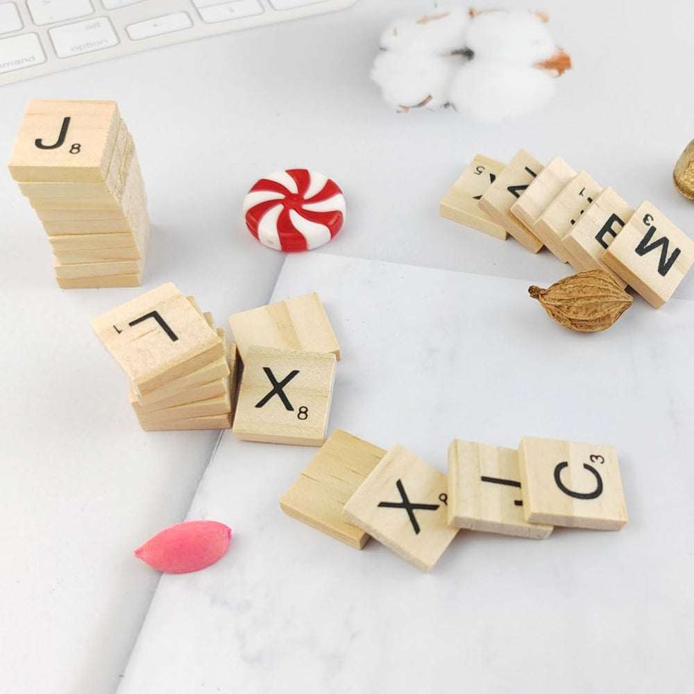 Tiles used in a spelling activity to build words with GXXMEI.