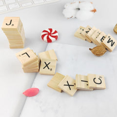 Tiles used in a spelling activity to build words with GXXMEI.