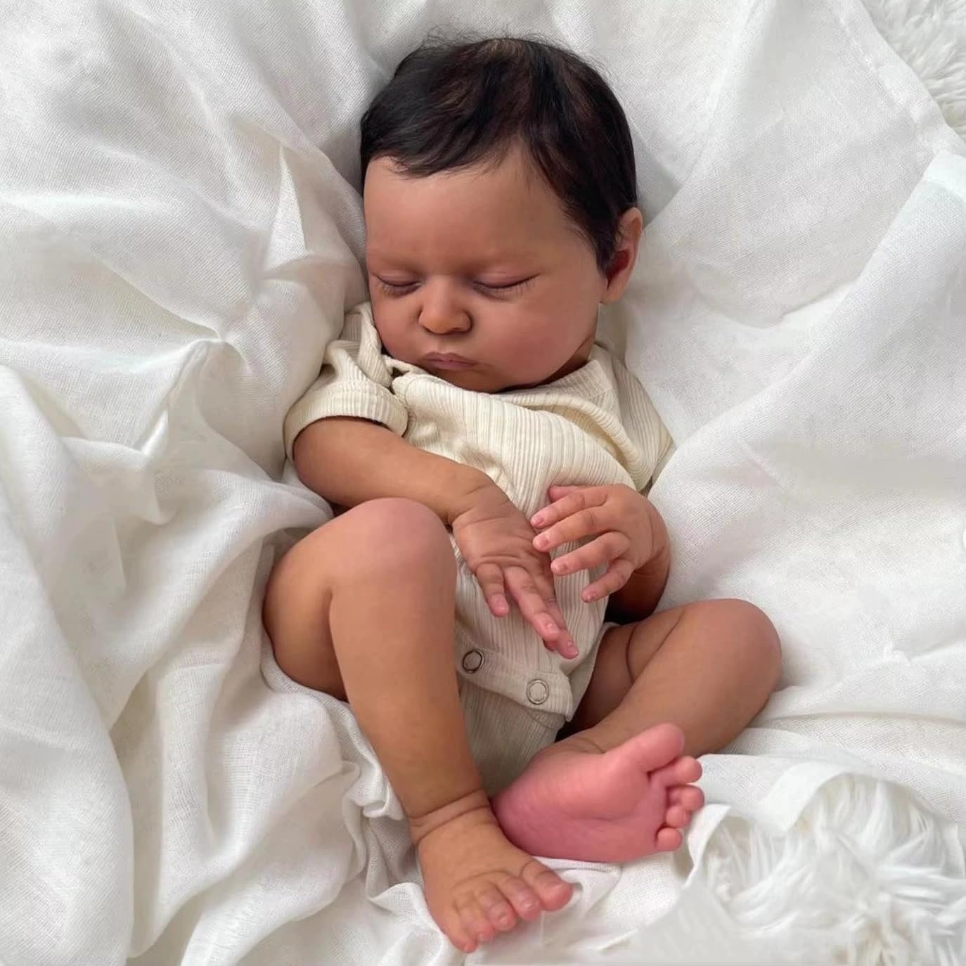 GYCV lifelike black reborn doll body with weighted cloth for cuddly, huggable touch.
