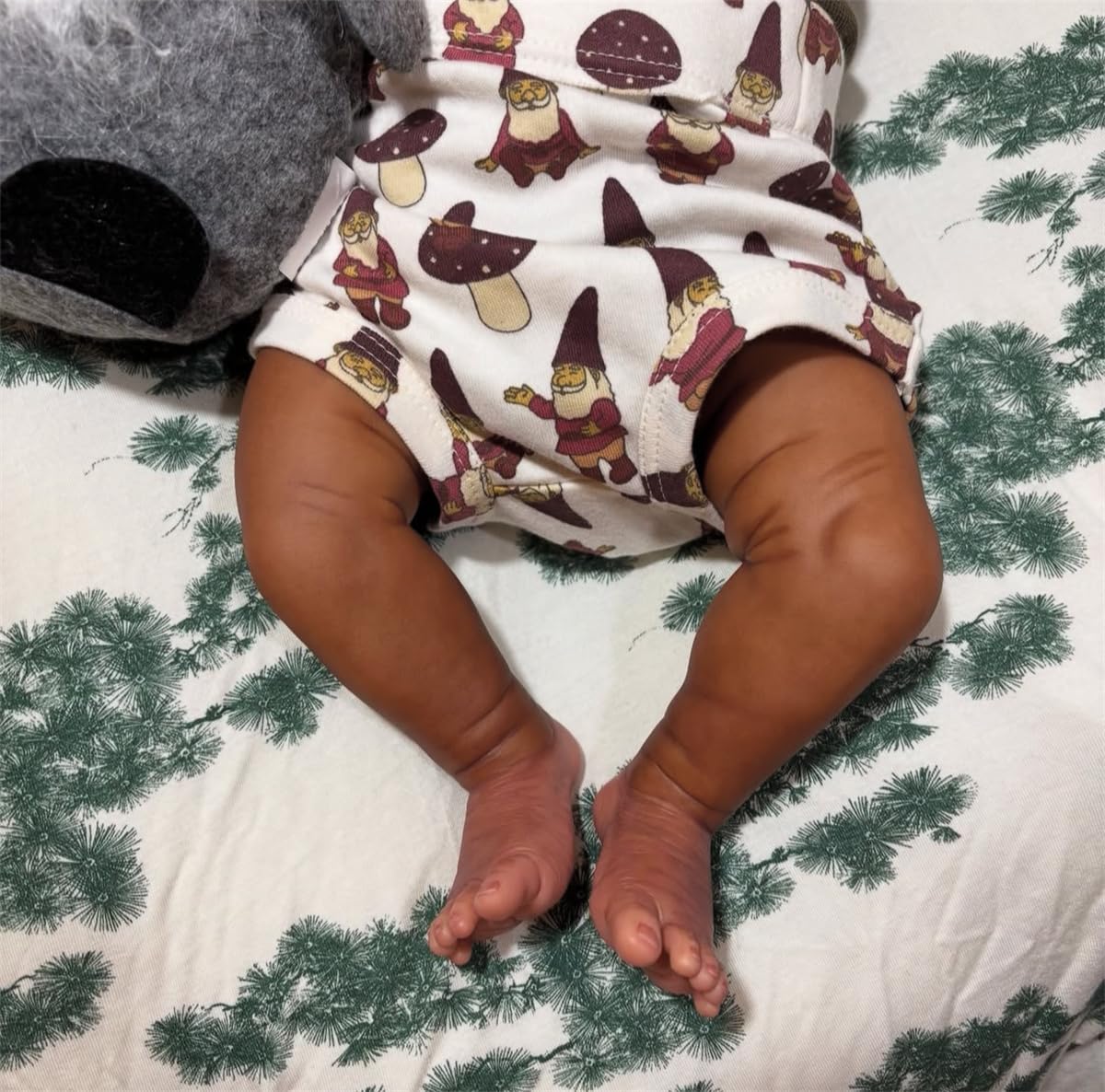 GYCV magnetic pacifier included with lifelike doll for care routines.