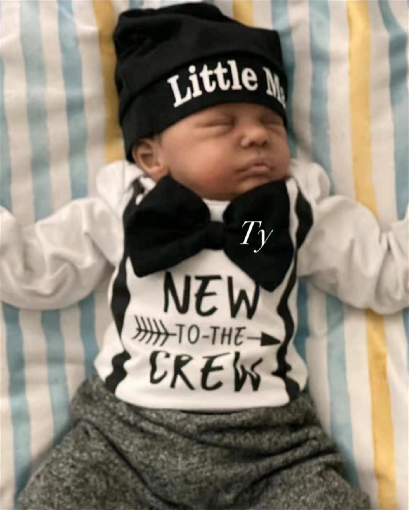 GYCV Realistic Reborn Baby Doll, black boy, 19-inch, suitable for imaginative play and cuddling.