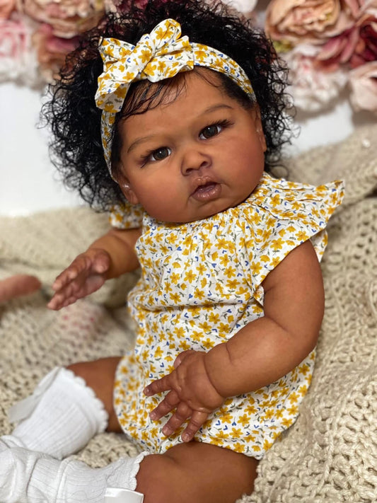 GYCV black girl doll with weighted body enabling realistic hugging and posing
