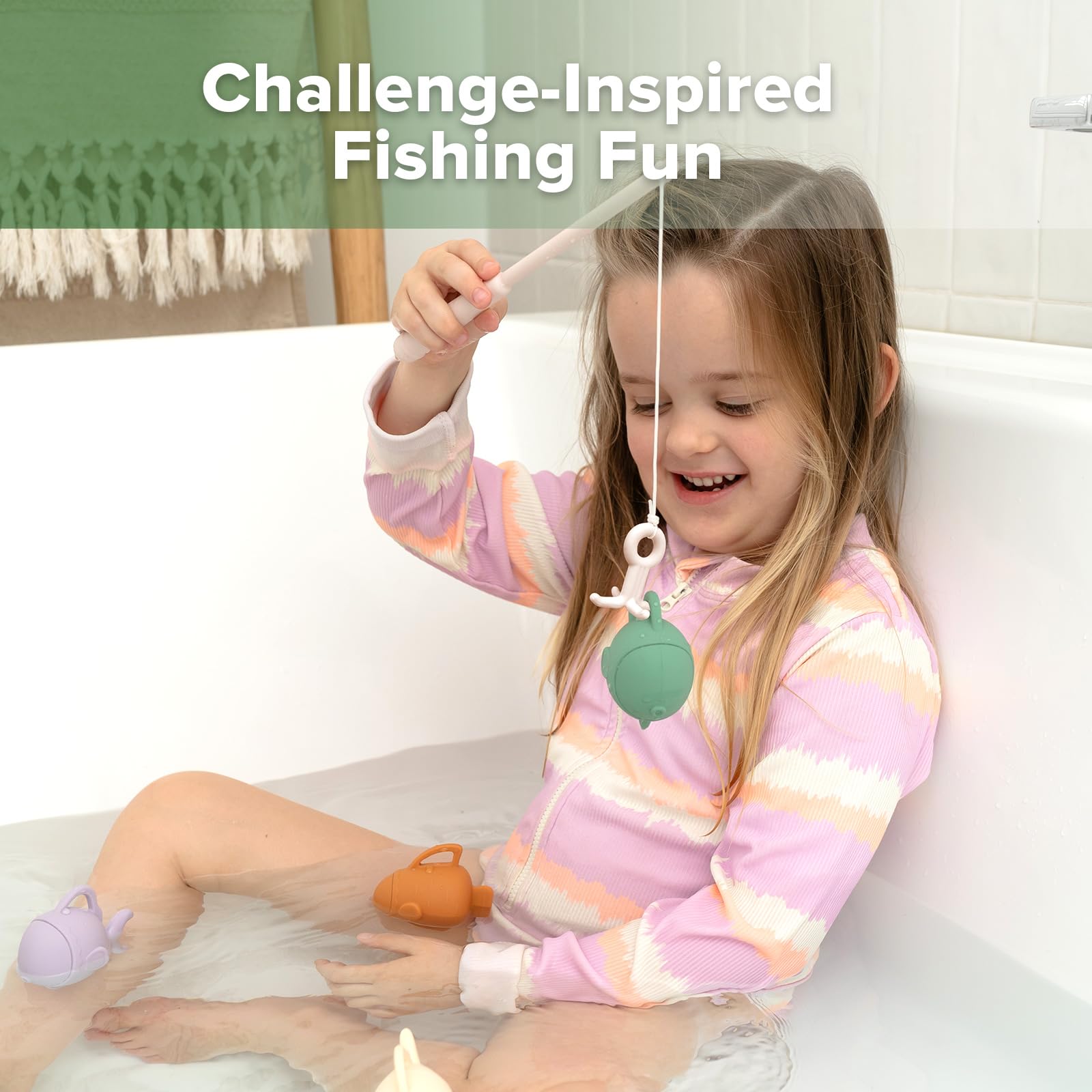haakaa silicone rod with weighted fish for grasping practice
