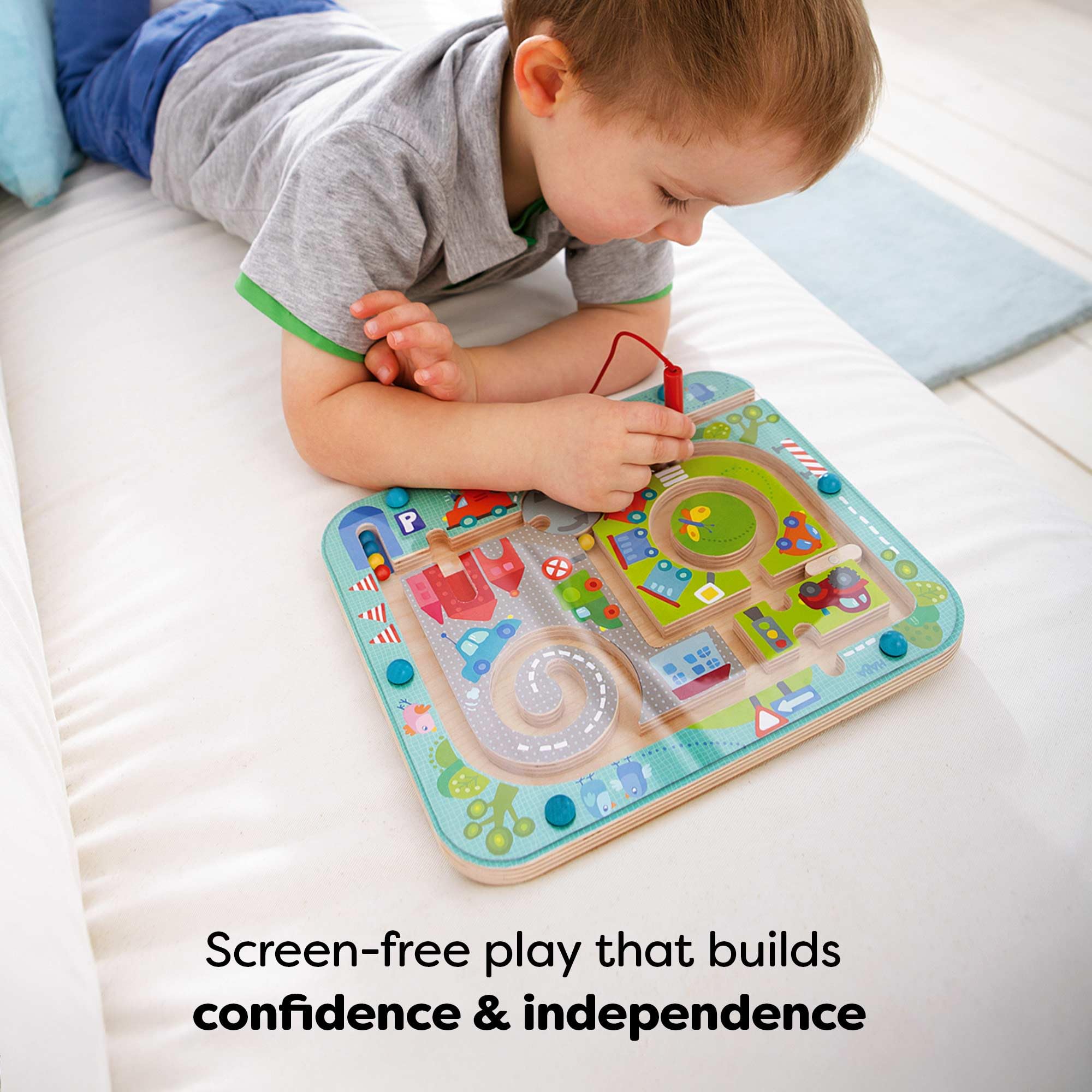 HABA Busy Board Town Maze features magnetic puzzle for focused screen-free play.