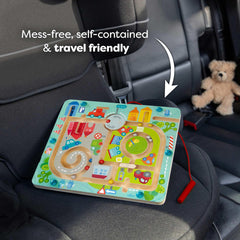 HABA Busy Board Town Maze in use with kids traveling offers interactive learning on road trips.