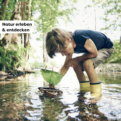 HABA natural materials like twigs and leaves for personalized design.