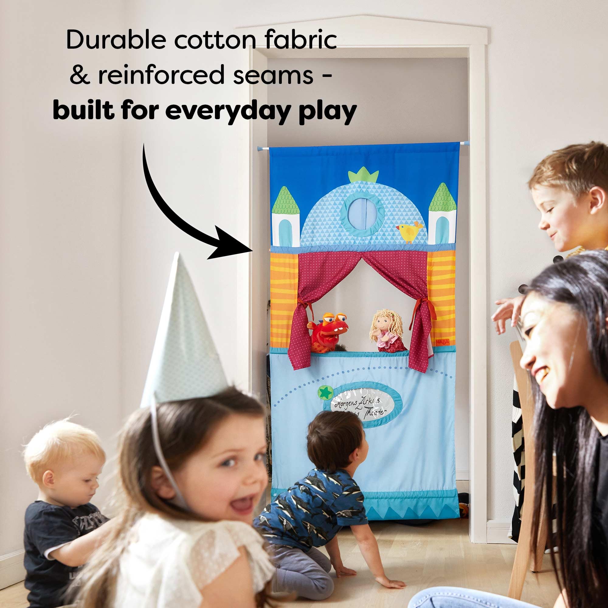 HABA doorway puppet theater pocket signage feature for custom scenes.