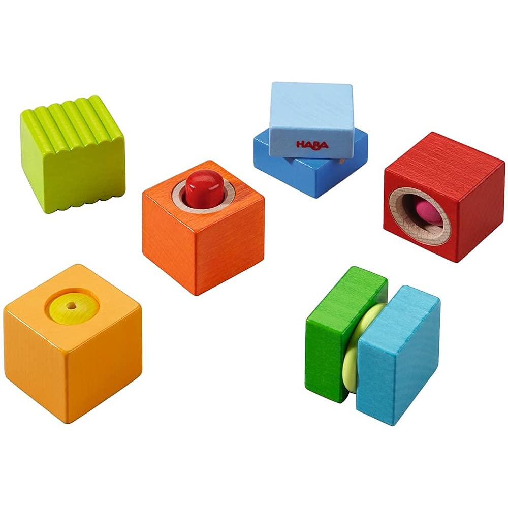 HABA Fun with Sounds blocks rattle for engaging sensory play and language development.