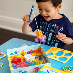 HABA Here Fishy Fishy pieces organization helps tidy storage after play.