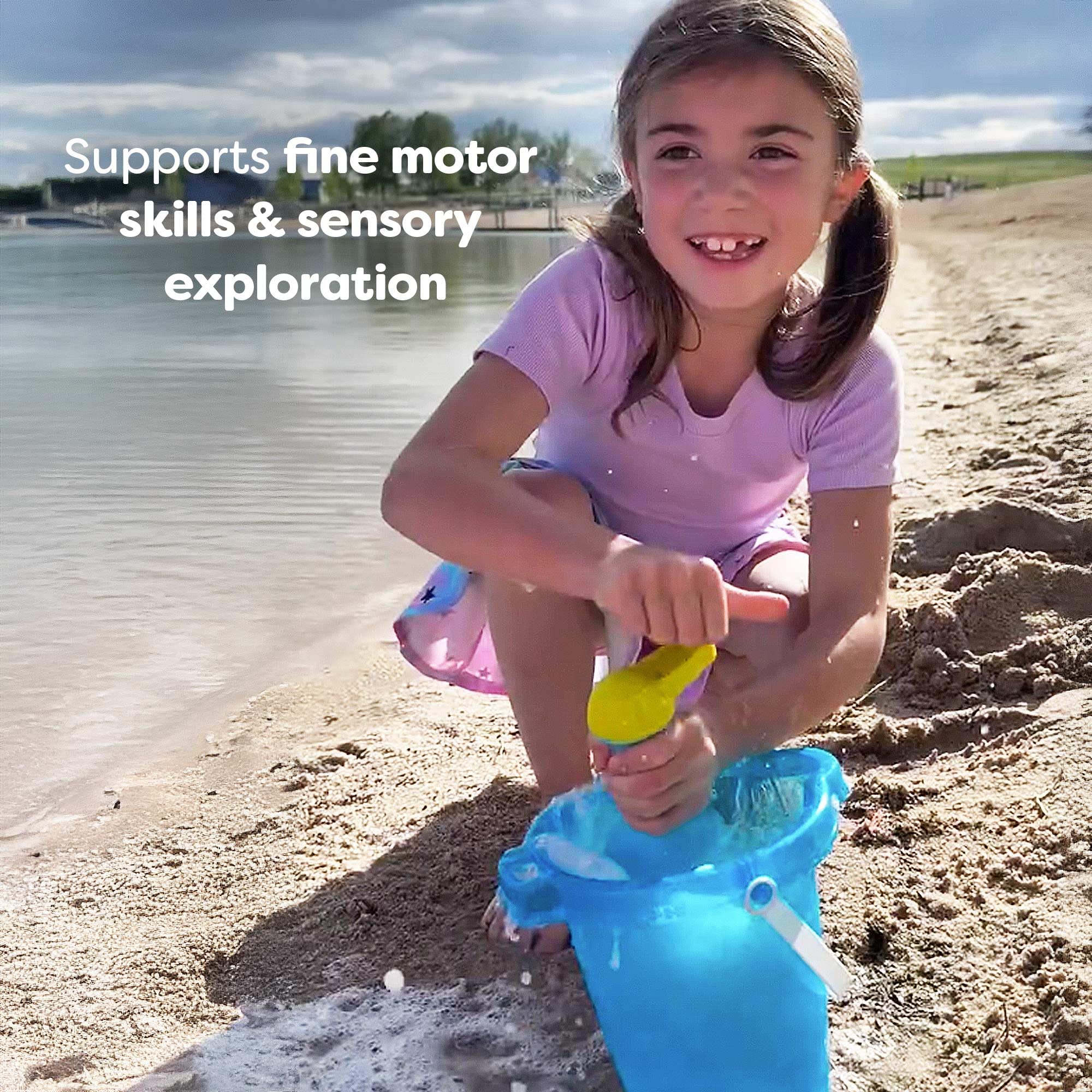 HABA outdoor bath whisk for backyard pretend play.