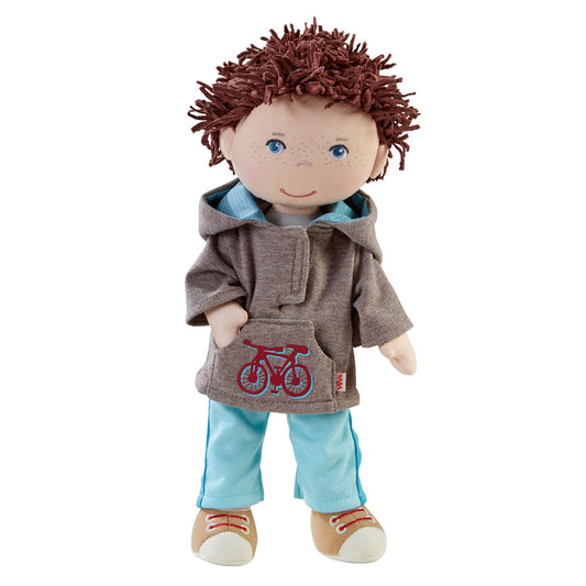 HABA Lian 12-inch doll with embroidered face and blue eyes, inviting imaginative play.