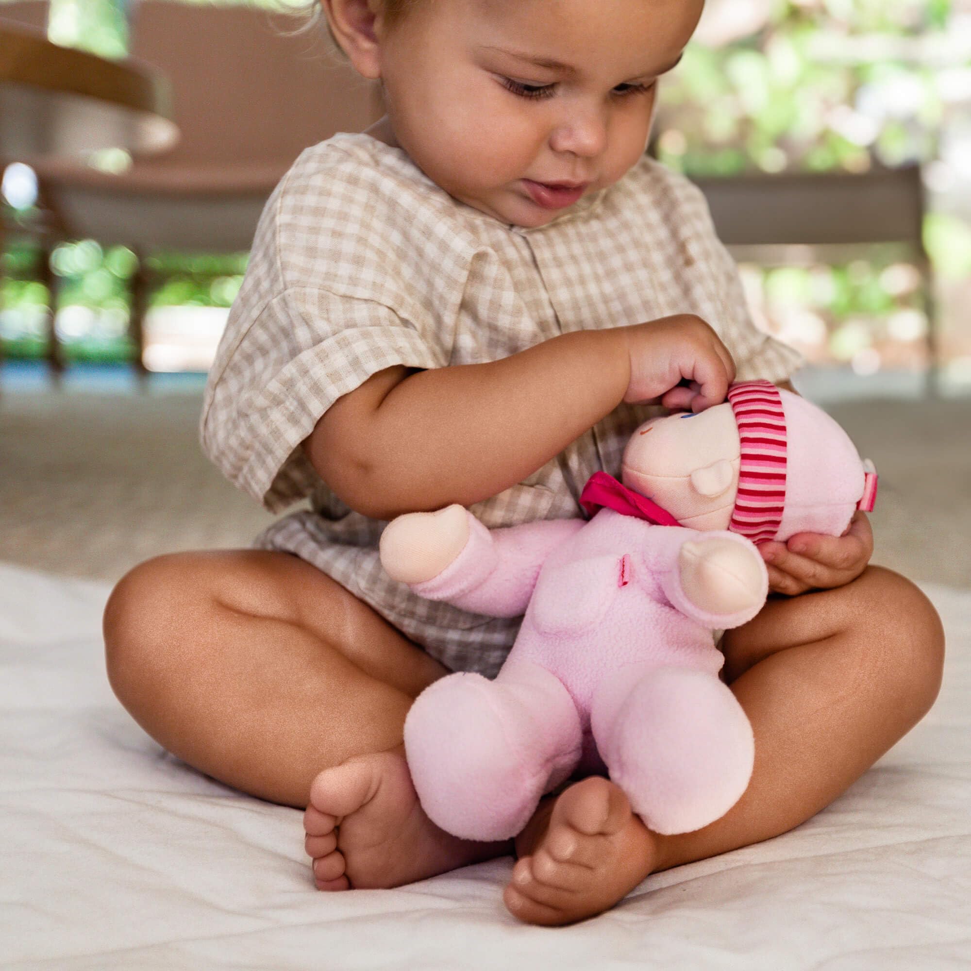 HABA Snug Up Luisa inspires imaginative play during early development.
