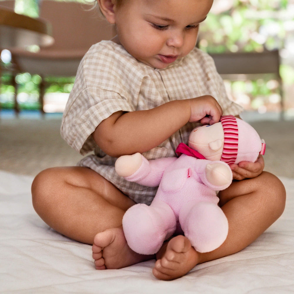 HABA Snug Up Luisa inspires imaginative play during early development.