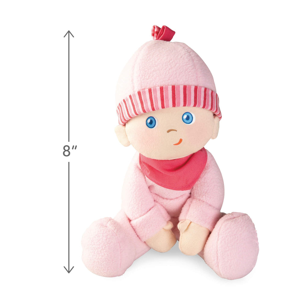Close-up of HABA Luisa's soft plush face inviting tactile exploration.