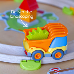 Children collaborate on the building site to develop teamwork and social skills