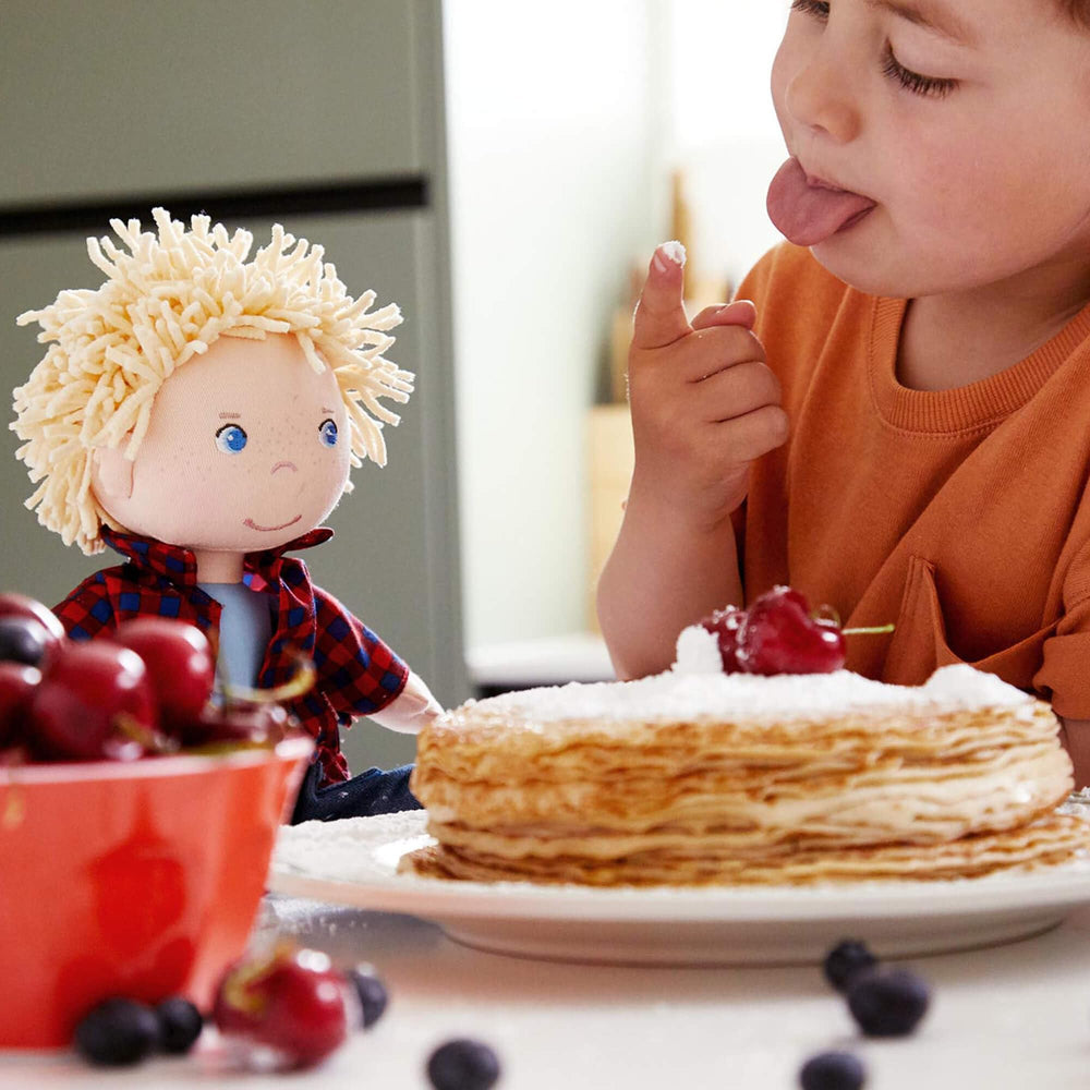 HABA Nick 12-inch doll blonde hair close-up showing soft textures.