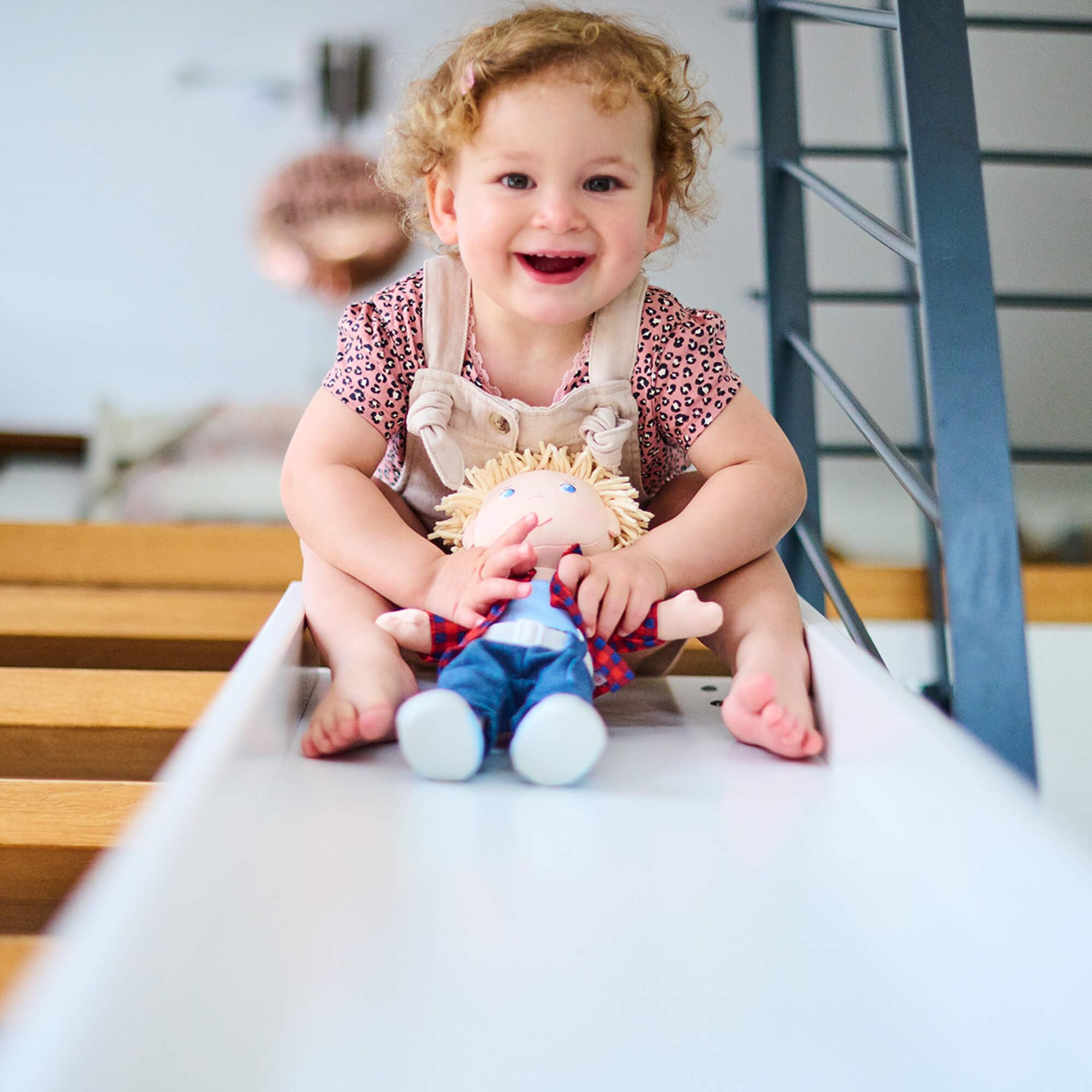 HABA Nick 12-inch doll seated position demonstrates sturdy design.