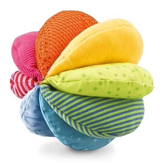HABA Rainbow Baby Ball closeup textures shows soft fabric and crinkle for sensory exploration.