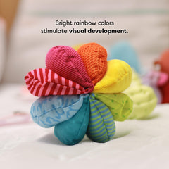 HABA Rainbow Baby Ball soft fabric cover provides safe, cozy play for babies.
