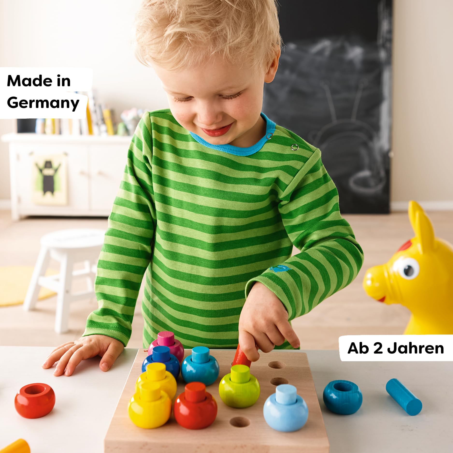 HABA Rainbow Whirls wood finish close-up, reveals beech wood and water-based stain.