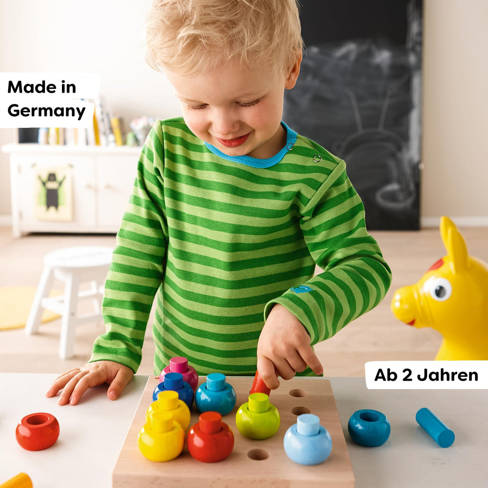 HABA Rainbow Whirls wood finish close-up, reveals beech wood and water-based stain.
