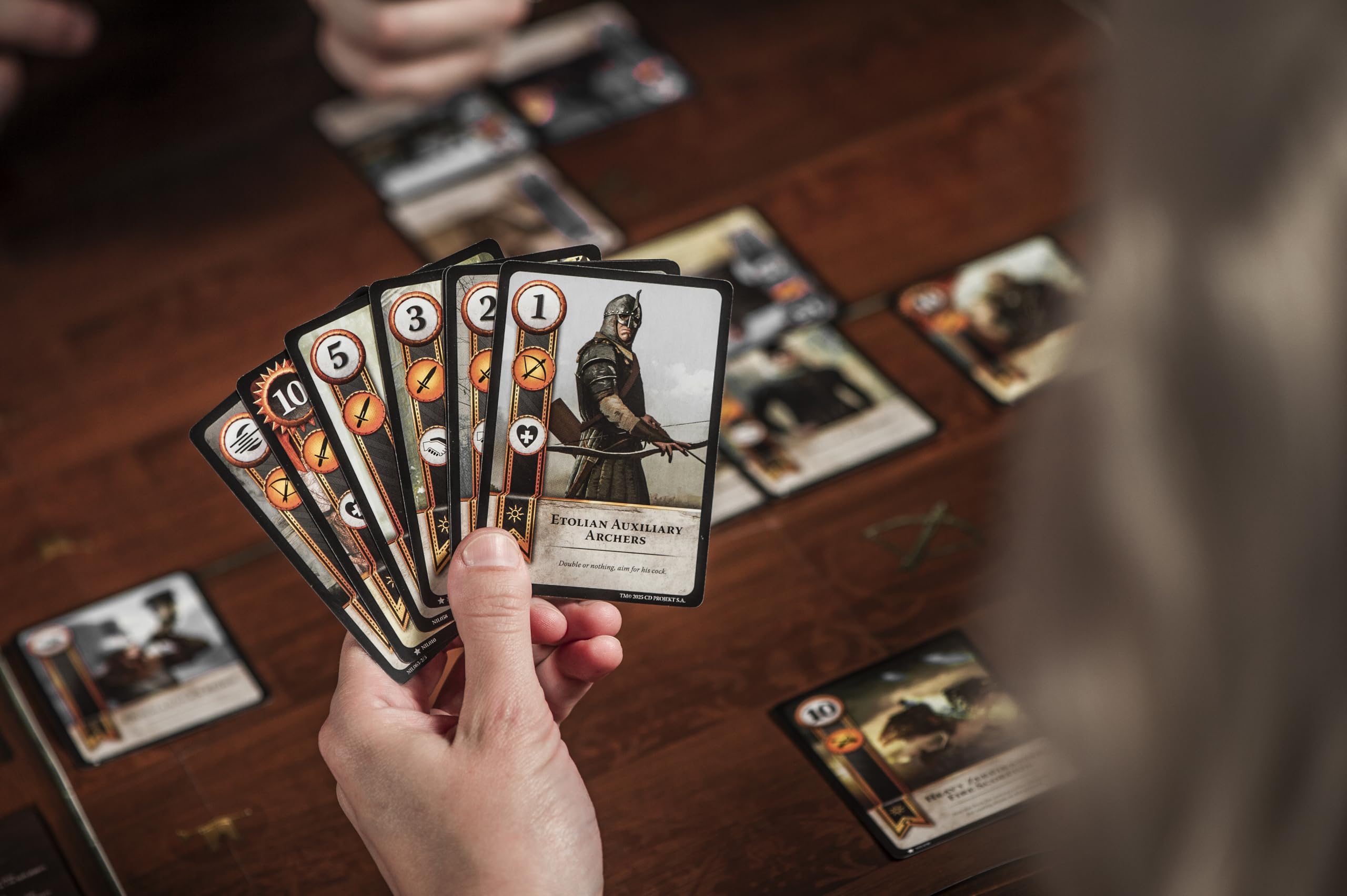 Hachette Boardgames Gwent is portable and surface-flexible for on-the-go play.