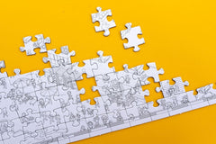 Hachette MicroMacro Funfair puzzle is suitable for ages 8 and up.