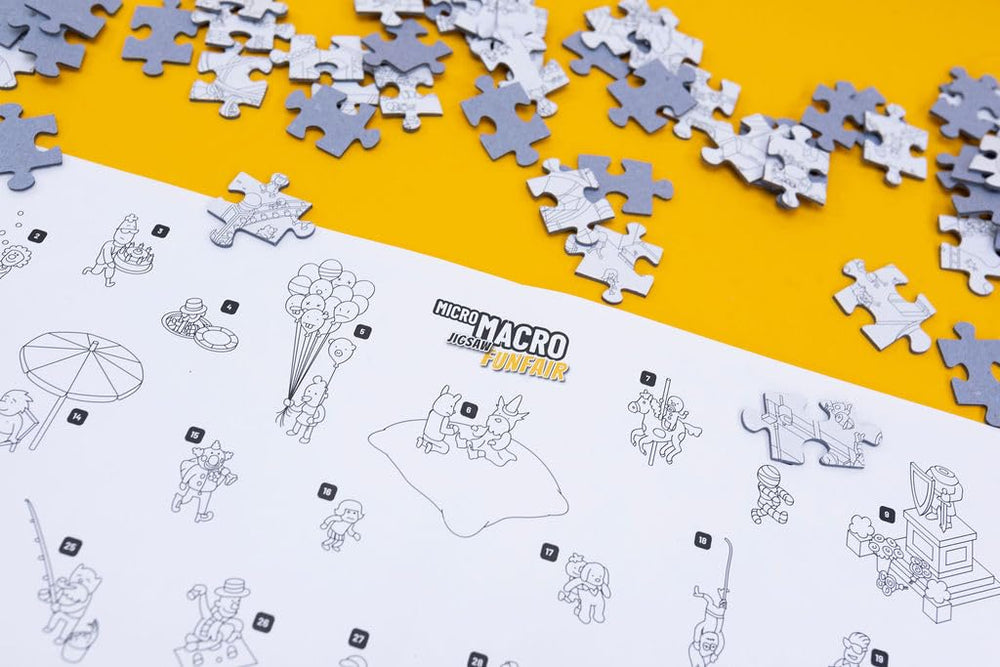 Printed in Germany with high-quality finish for Hachette MicroMacro Funfair puzzle.