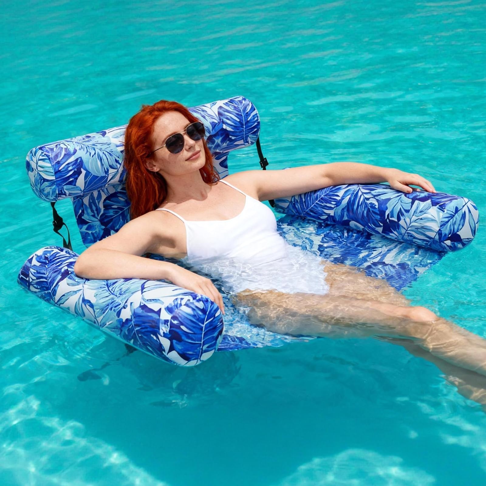 HAGUL blue tropical leaf print adds vibrant, stylish flair to poolside lounging.