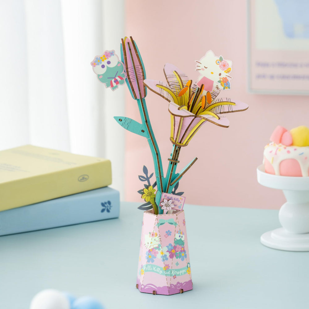 Hands Craft Hello Kitty Keroppi Lily puzzle pieces laid out for easy assembly.