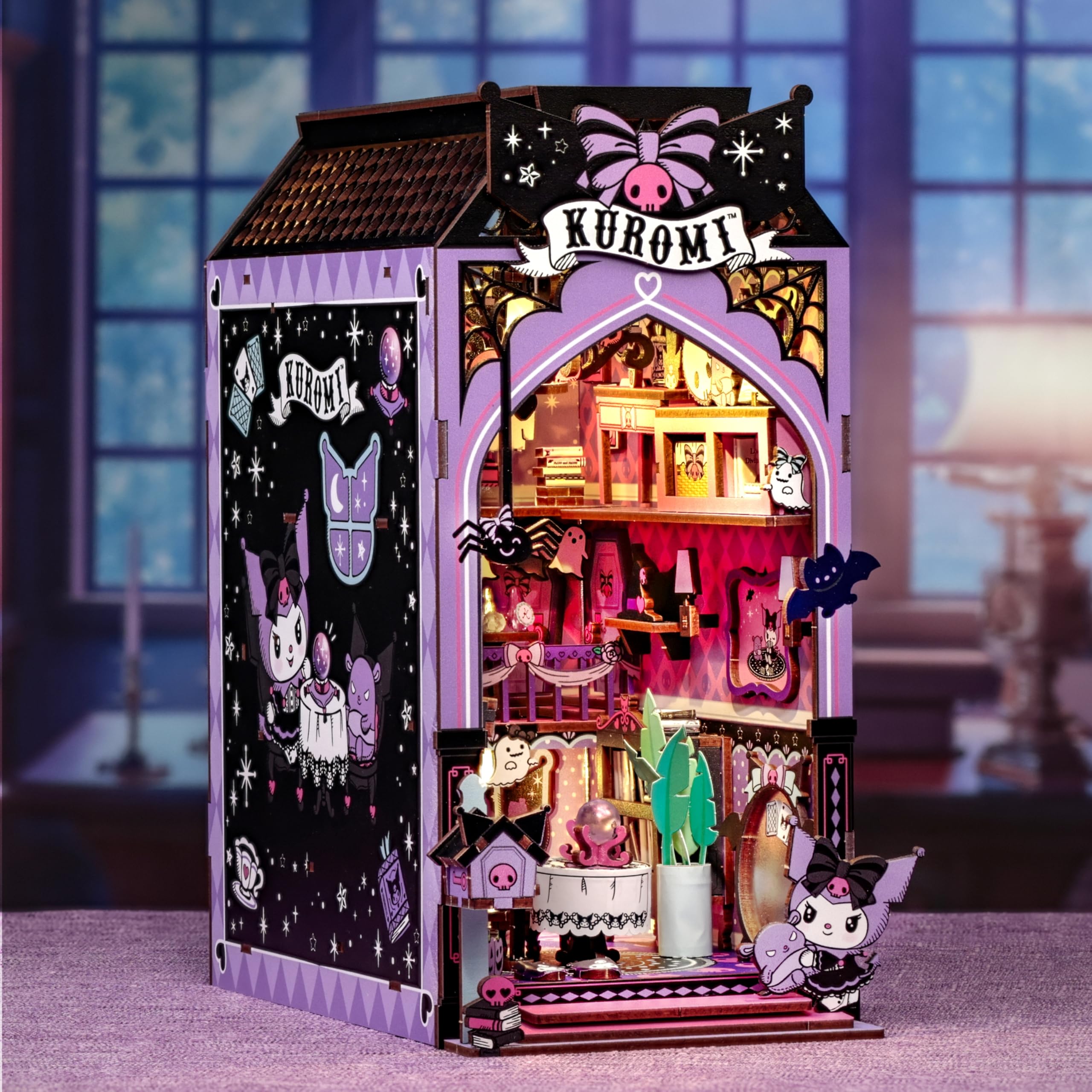 Hands Craft Kuromi spooky house ghost garlands and bats arranged on a shelf
