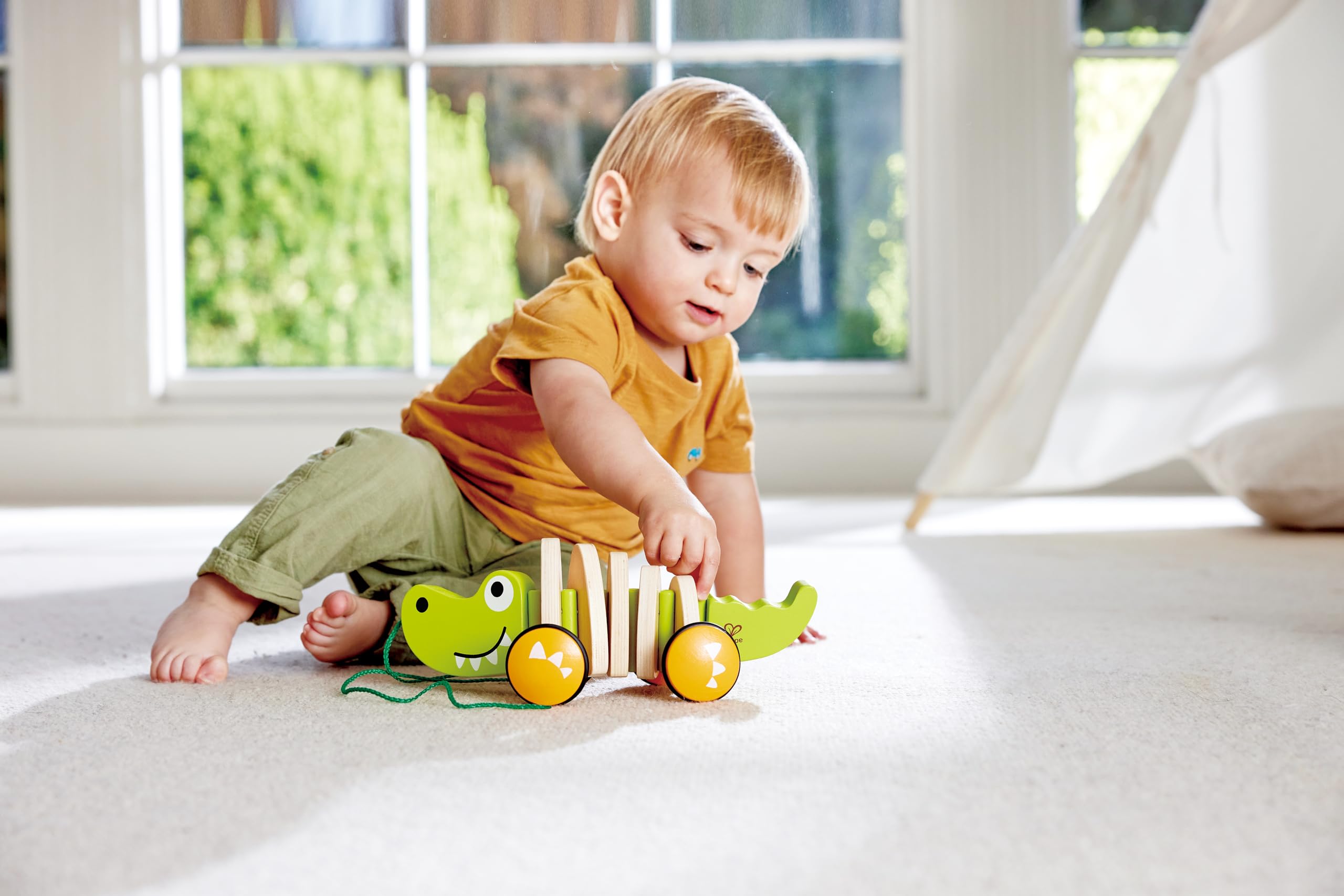 Hape Walkalong Croc encourages exploration and cooperative play on walks.