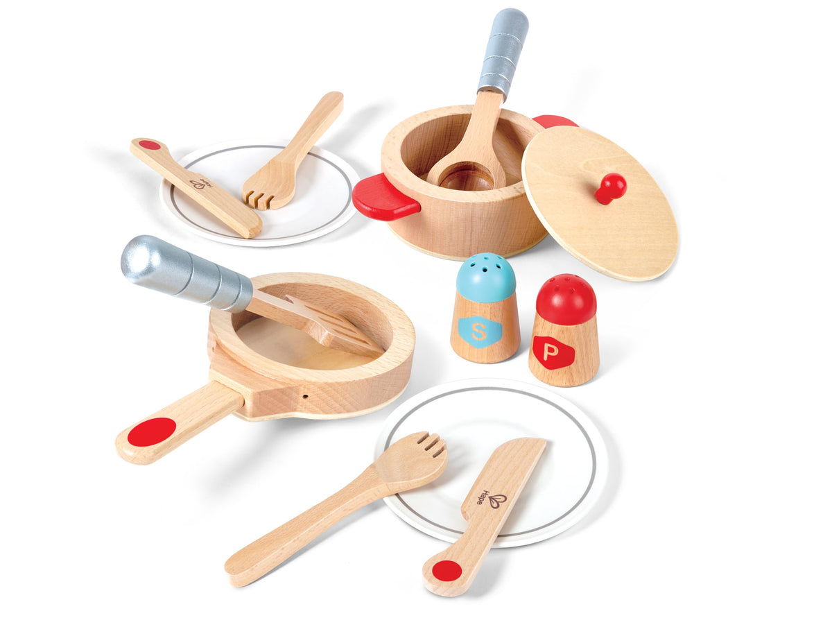 Hape Cook and Serve Set pot and lid support imaginative pretend cooking.