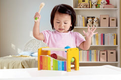Hape Pound & Tap Bench toddler play session promoting motor skills