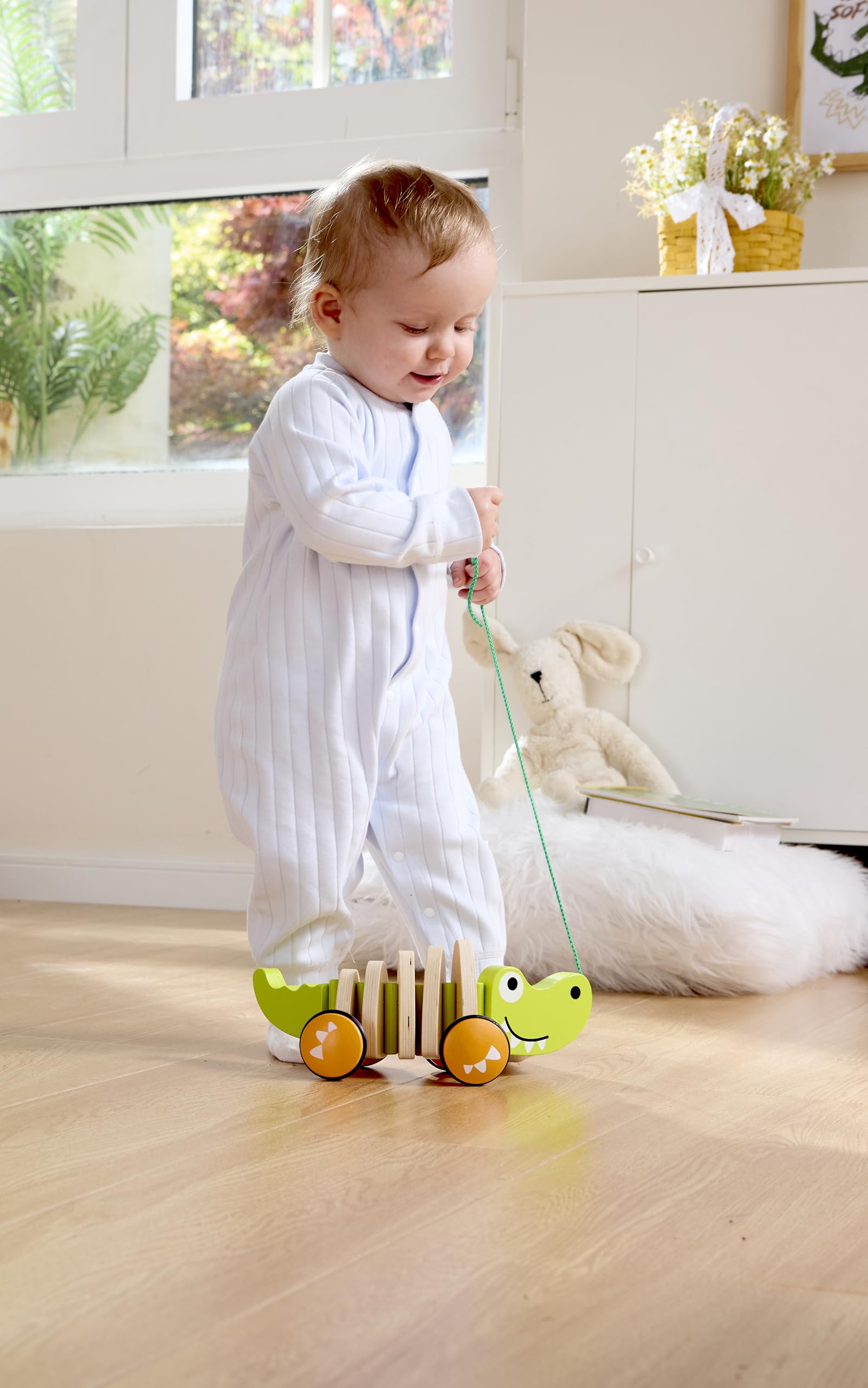 Hape rubber and wooden wheels minimize noise and floor marks.