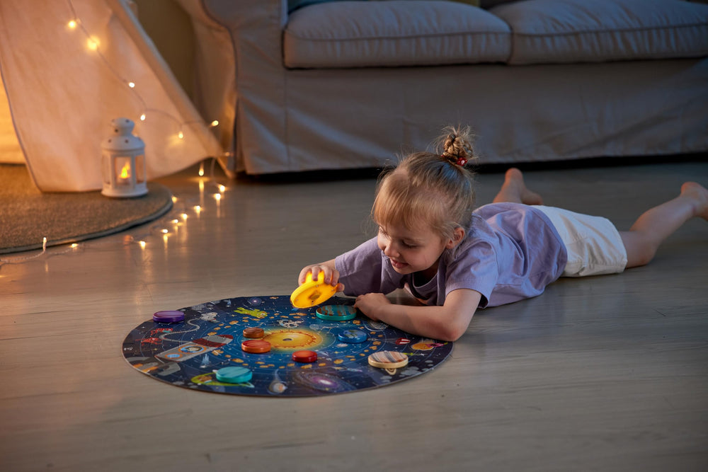 Kids place planets to learn order and positions on the board