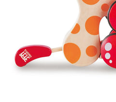 Hape Walk-A-Long Puppy being pulled by a child during imaginative play