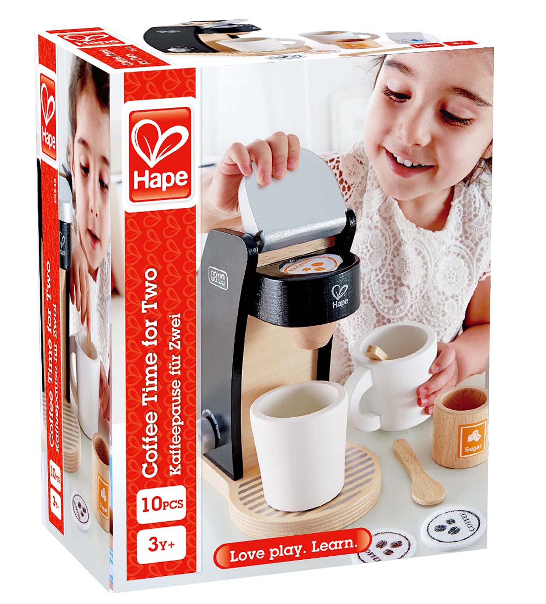 Hape playset includes milk and sugar for realistic kitchen pretend rituals.