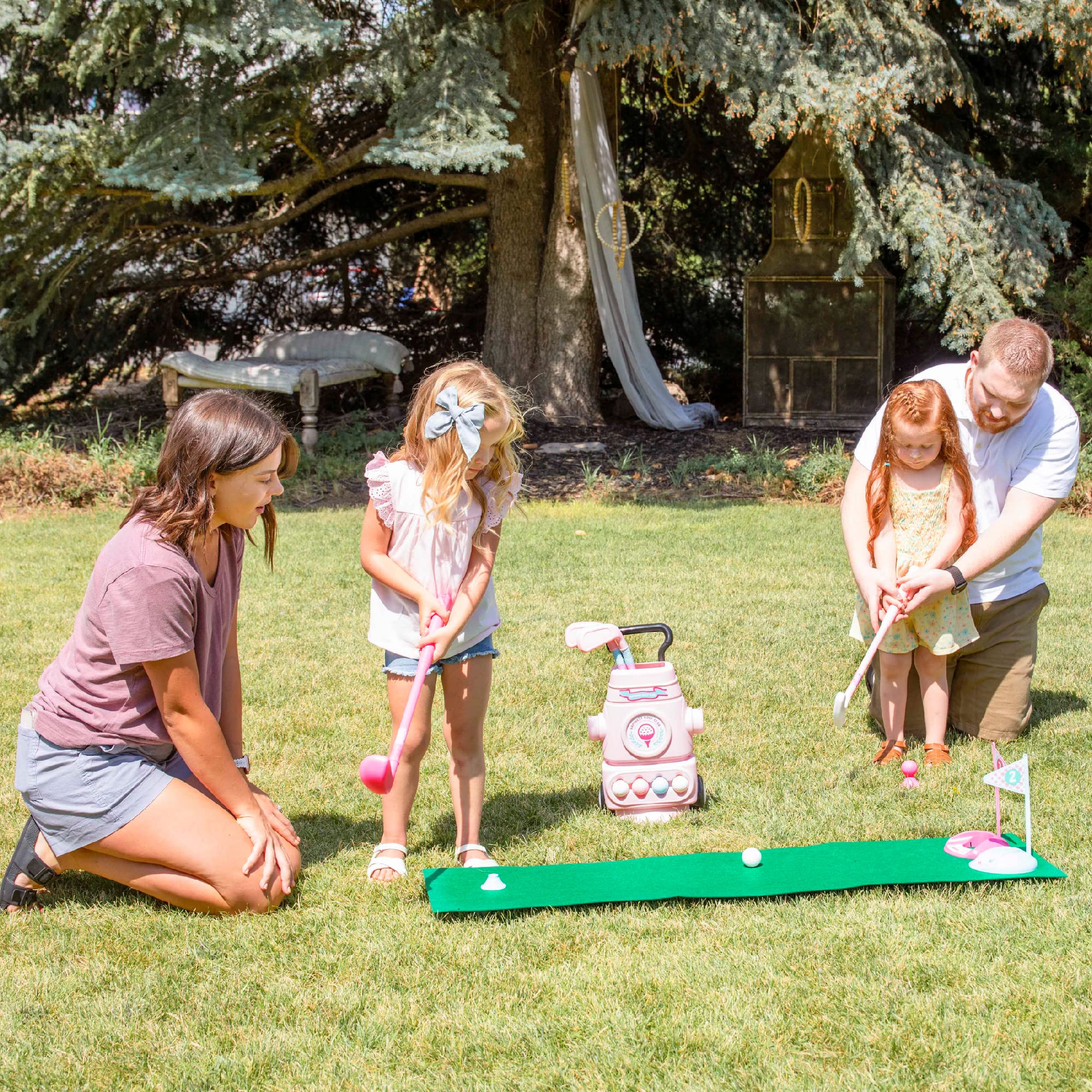Hapinest indoor-outdoor golf play promotes active pretend play.