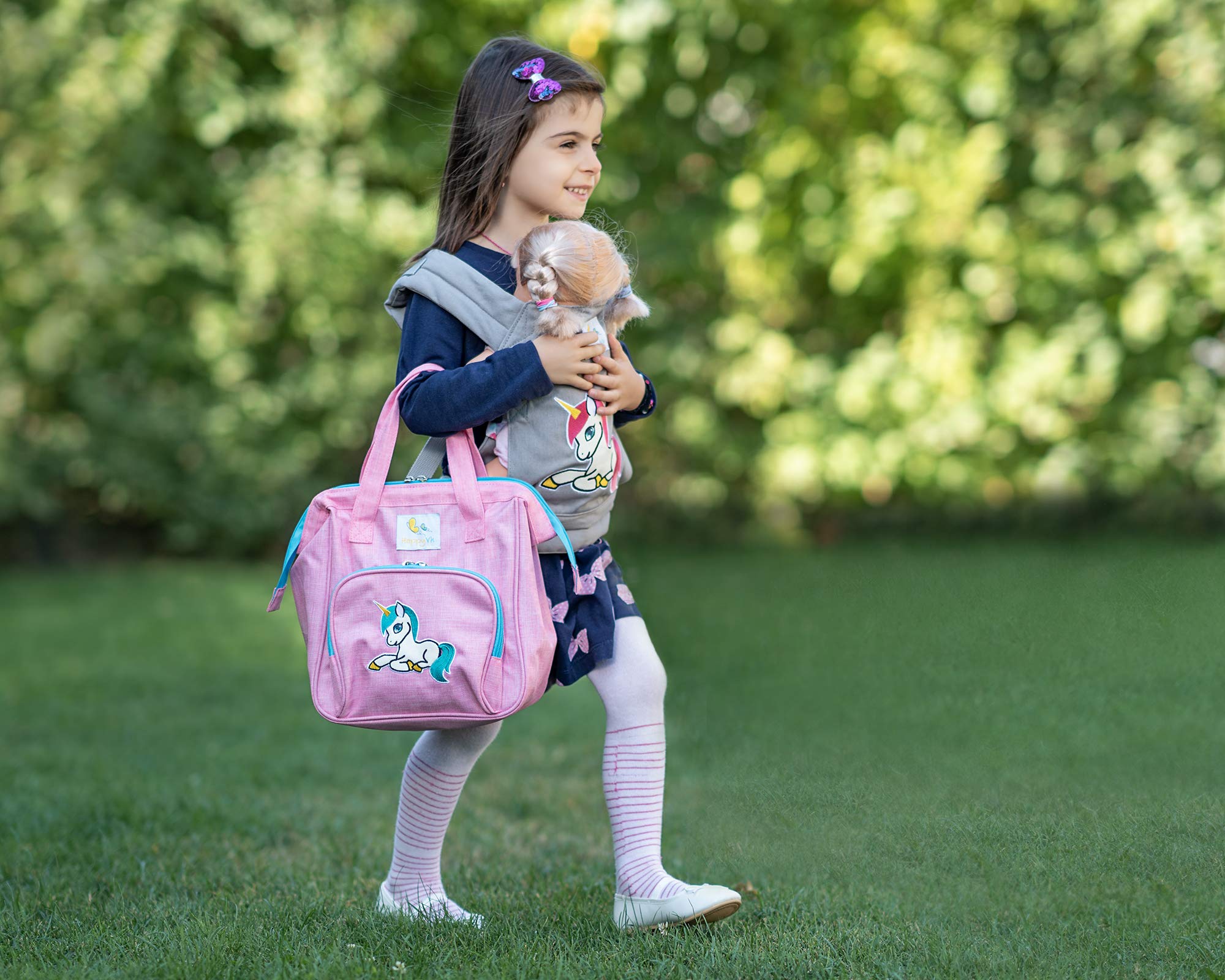 HappyVk doll bag in use during pretend play with multiple pockets
