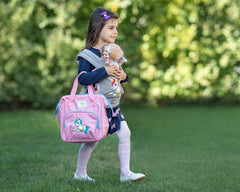 HappyVk doll bag in use during pretend play with multiple pockets