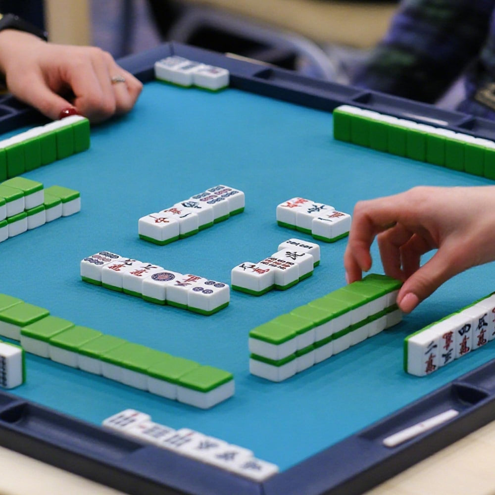 Size comparison highlights compact mini tiles for portable entertainment.