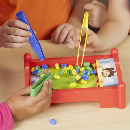 Hasbro Gaming Bed Bugs blue-tongs for catching blue bugs quickly.