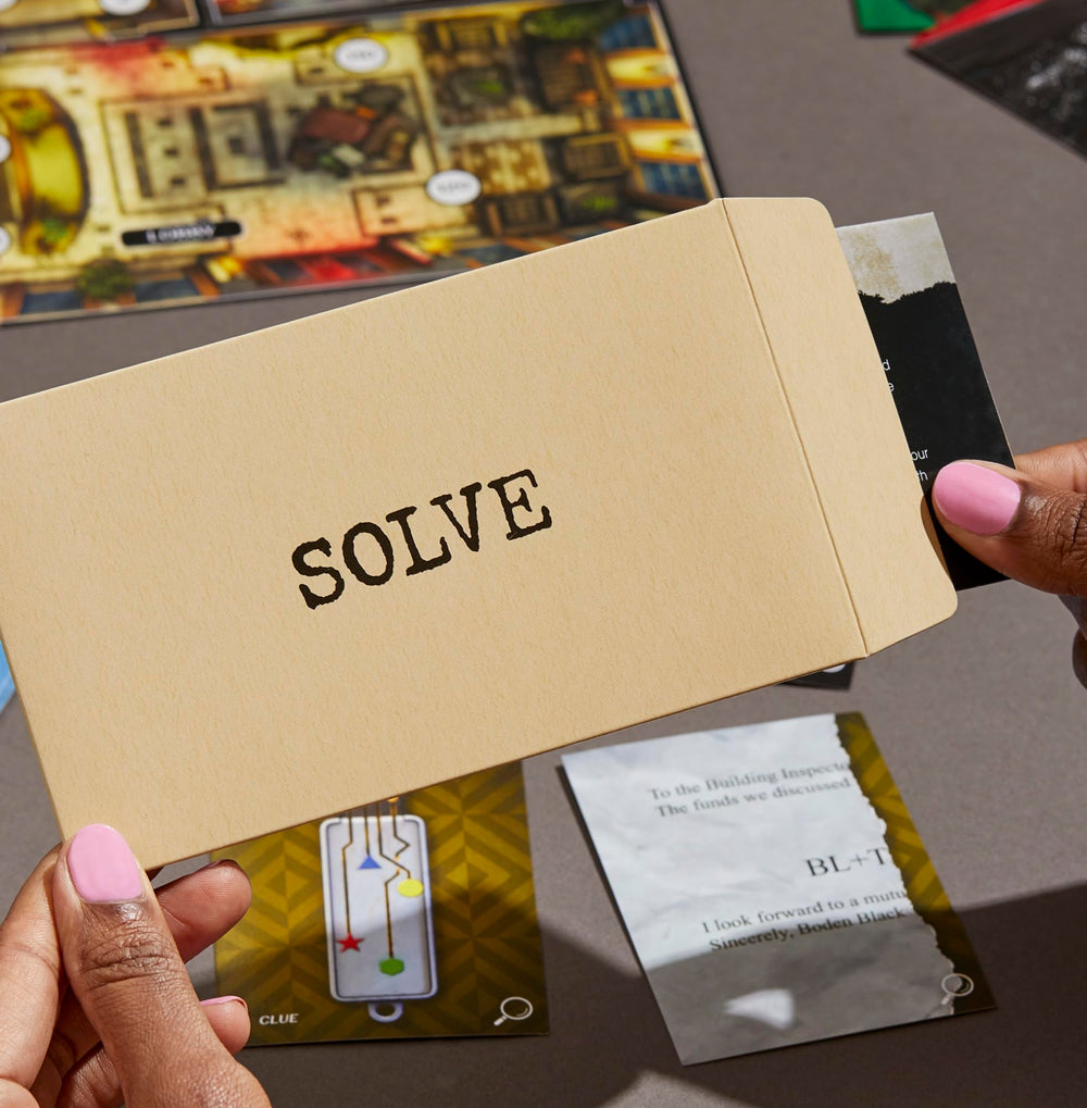 Hasbro Clue Escape Midnight Hotel deduction scene highlights collaborative thinking
